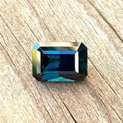 Australian Green Blue Sapphire – Emerald Cut | 2.4 Carat -Sapphire Pal Shop australian green blue sapphire emerald cut 24 caratsapphirepal 662697