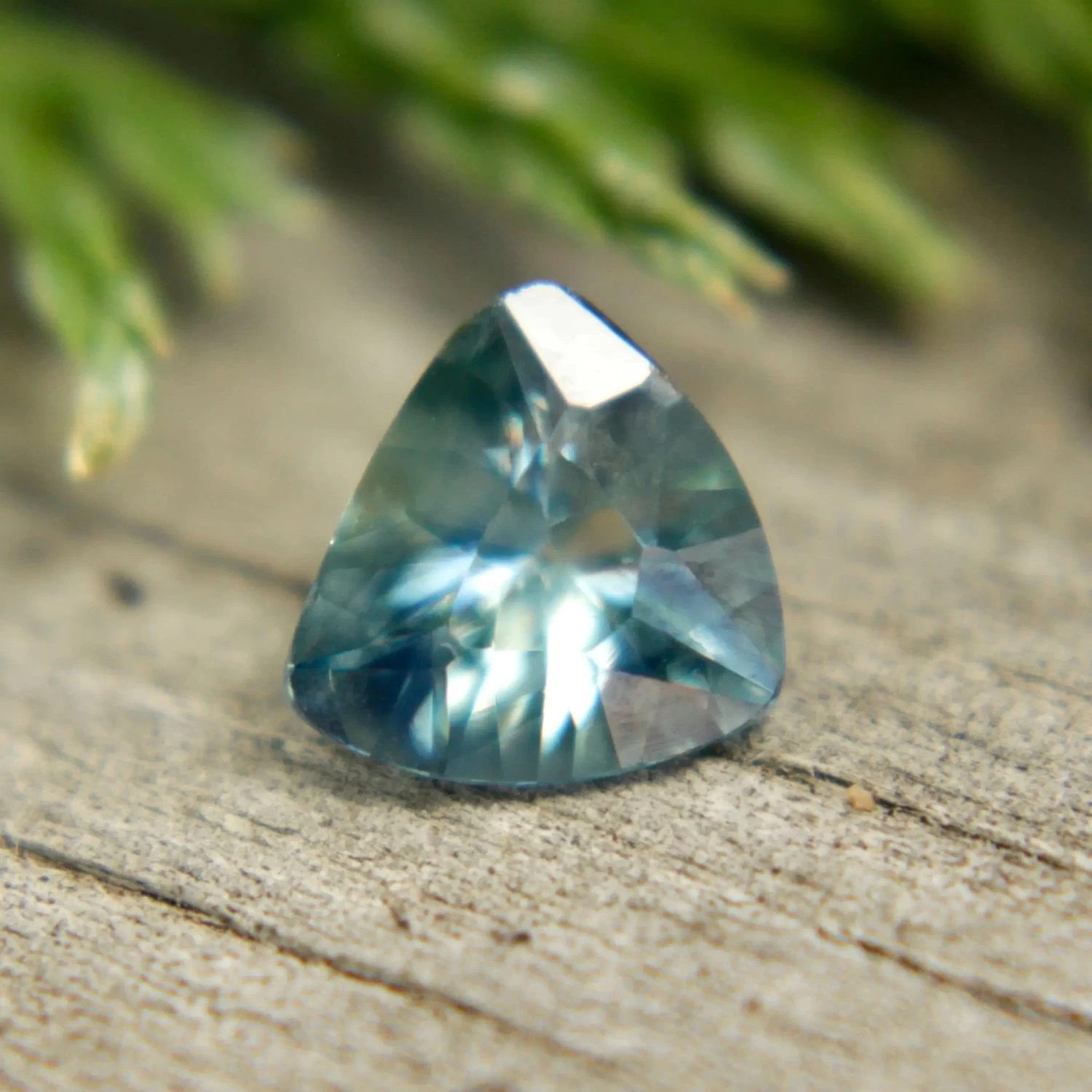 Natural Blue Green Sapphire – 0.61 Carat Trillion Cut | Unheated Madagascar Gemstone 1 Natural Blue Green Sapphire – 0.61 Carat Trillion Cut | Unheated Madagascar Gemstone