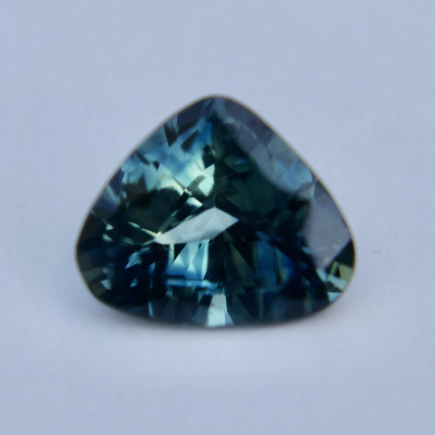 Natural Blue Green Sapphire – 1.31 Carat Trillion Cut | Unheated Madagascar Gemstone 5 Natural Blue Green Sapphire – 1.31 Carat Trillion Cut | Unheated Madagascar Gemstone - Image 5