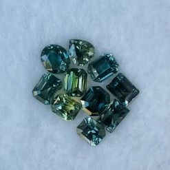 Natural Blue Green Sapphire Collection | 6.08 Carats Total 22 Natural Blue Green Sapphire Collection | 6.08 Carats Total -Sapphire Pal Shop natural blue green sapphire collection 608 carats totalsapphirepal 109302