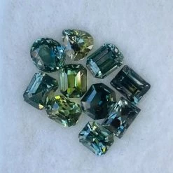 Natural Blue Green Sapphire Collection | 6.08 Carats Total 19 Natural Blue Green Sapphire Collection | 6.08 Carats Total -Sapphire Pal Shop natural blue green sapphire collection 608 carats totalsapphirepal 465799