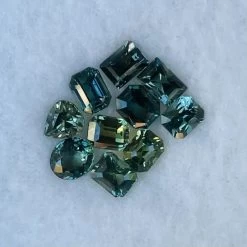 Natural Blue Green Sapphire Collection | 6.08 Carats Total 24 Natural Blue Green Sapphire Collection | 6.08 Carats Total -Sapphire Pal Shop natural blue green sapphire collection 608 carats totalsapphirepal 582494