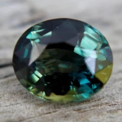 Natural Green Parti Sapphire – 5.05 Carat | Oval Cut | Eye Clean Clarity -Sapphire Pal Shop natural green parti sapphire 505 carat oval cut eye clean claritysapphirepal 452401