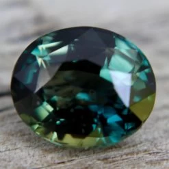 Natural Green Parti Sapphire – 5.05 Carat | Oval Cut | Eye Clean Clarity -Sapphire Pal Shop natural green parti sapphire 505 carat oval cut eye clean claritysapphirepal 529675