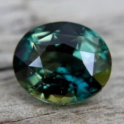 Natural Green Parti Sapphire – 5.05 Carat | Oval Cut | Eye Clean Clarity -Sapphire Pal Shop natural green parti sapphire 505 carat oval cut eye clean claritysapphirepal 754354
