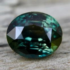 Natural Green Parti Sapphire – 5.05 Carat | Oval Cut | Eye Clean Clarity -Sapphire Pal Shop natural green parti sapphire 505 carat oval cut eye clean claritysapphirepal 914214