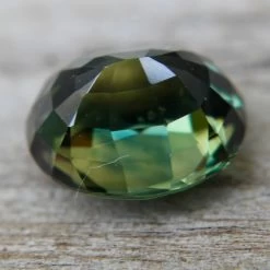 Natural Green Parti Sapphire – 5.05 Carat | Oval Cut | Eye Clean Clarity -Sapphire Pal Shop natural green parti sapphire 505 carat oval cut eye clean claritysapphirepal 916558