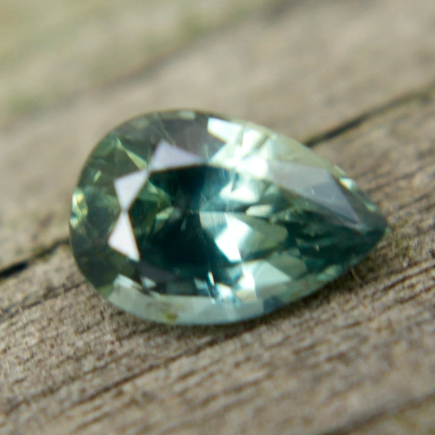Natural Green Sapphire, Pear Cut (0.85 Ct) 1 Natural Green Sapphire, Pear Cut (0.85 Ct)
