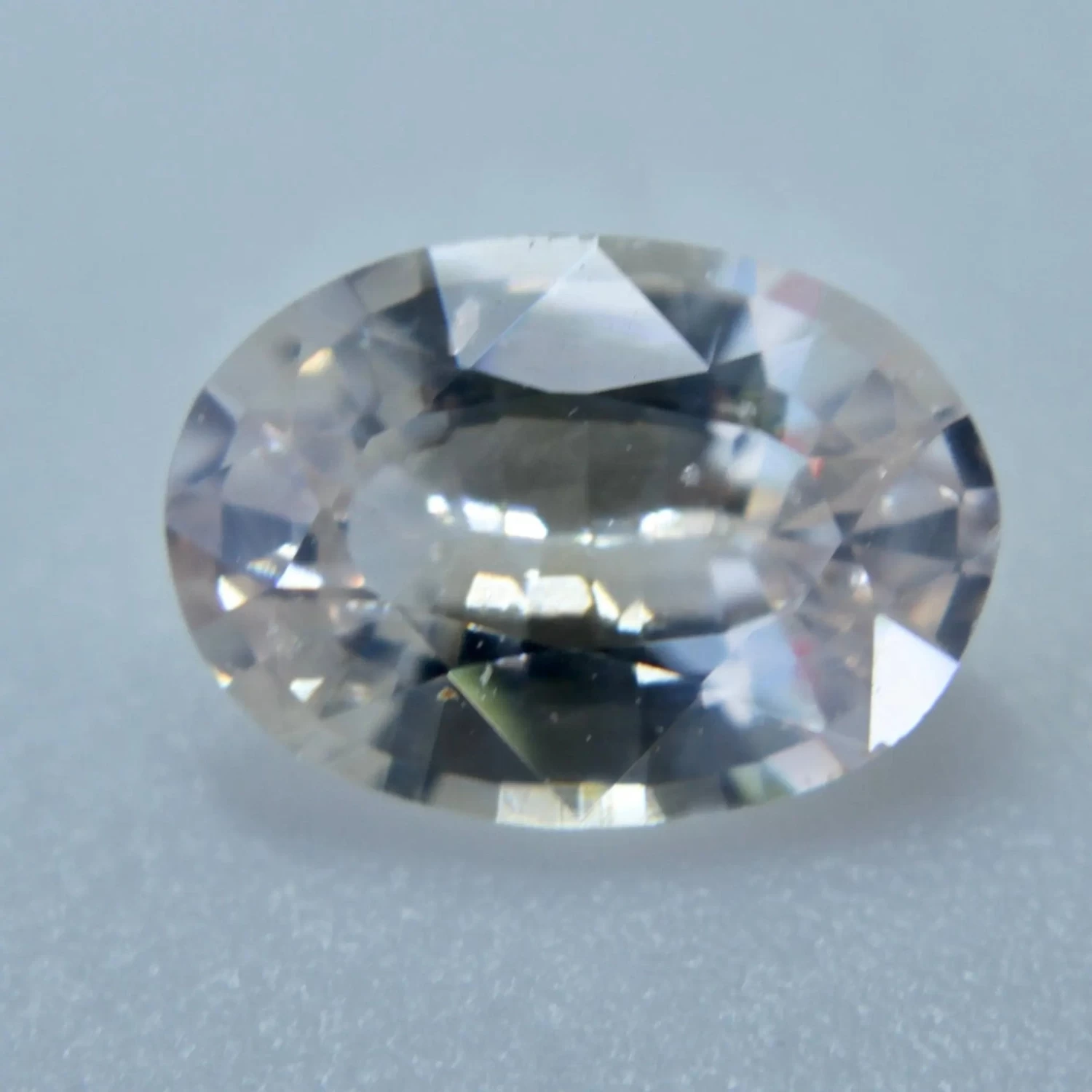 Natural Orange Pink Sapphire – 1.40 Carat Oval Cut | Unheated Gemstone 5 Natural Orange Pink Sapphire – 1.40 Carat Oval Cut | Unheated Gemstone - Image 5