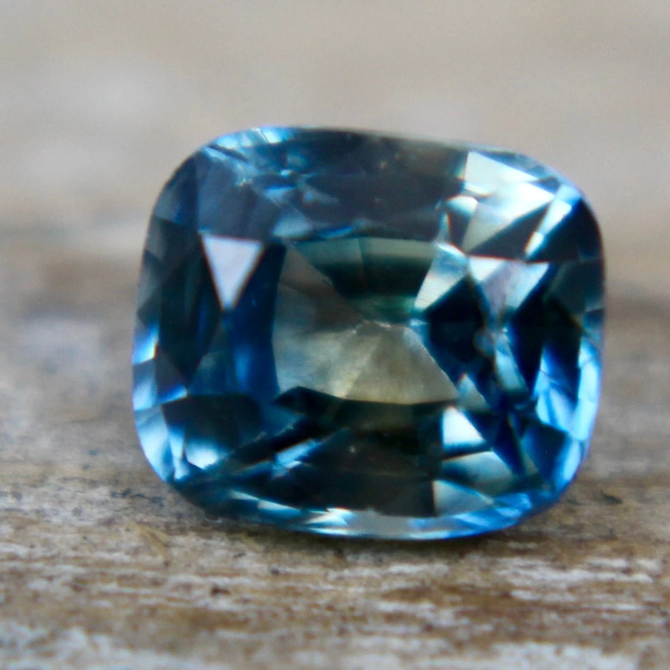 Natural Parti Sapphire – 0.60 Carat | Cushion Cut | Ceylon Gemstones 6 Natural Parti Sapphire – 0.60 Carat | Cushion Cut | Ceylon Gemstones - Image 6