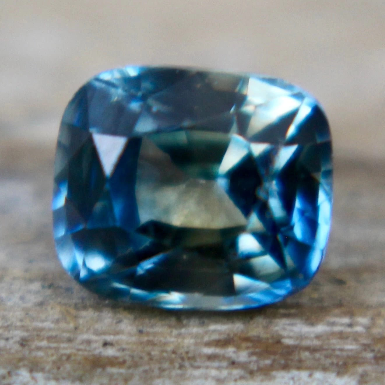Natural Parti Sapphire – 0.60 Carat | Cushion Cut | Ceylon Gemstones 7 Natural Parti Sapphire – 0.60 Carat | Cushion Cut | Ceylon Gemstones - Image 7