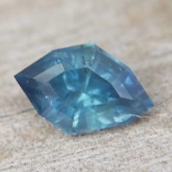 Natural Teal Sapphire – 0.71 Carat Freeform Cut | Unheated -Sapphire Pal Shop natural teal sapphire 071 carat freeform cut unheatedsapphirepal 895322