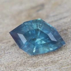 Natural Teal Sapphire – 0.71 Carat Freeform Cut | Unheated -Sapphire Pal Shop natural teal sapphire 071 carat freeform cut unheatedsapphirepal 898433