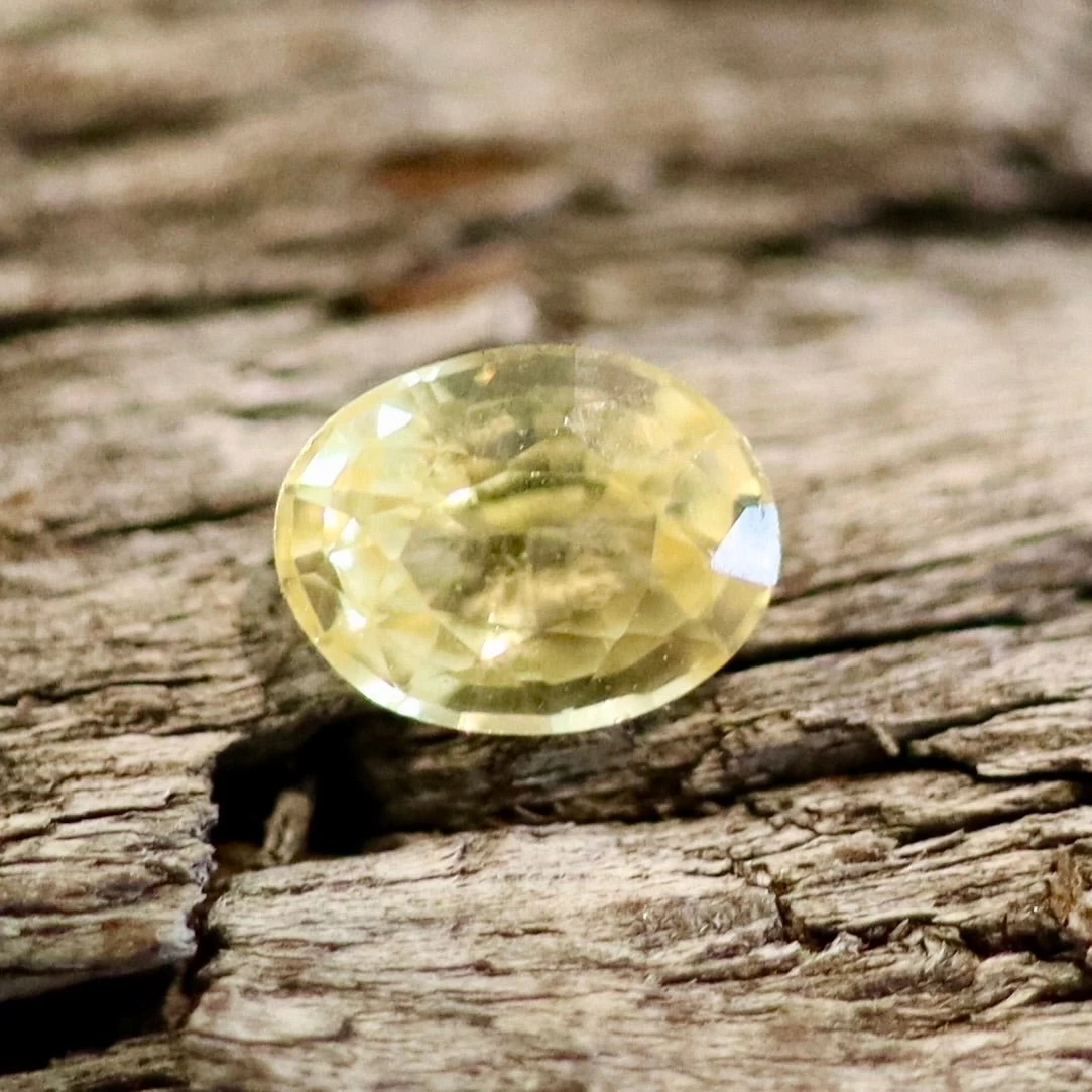 Natural Yellow Sapphire – 0.65 Carat | Oval Cut 4 Natural Yellow Sapphire – 0.65 Carat | Oval Cut - Image 4