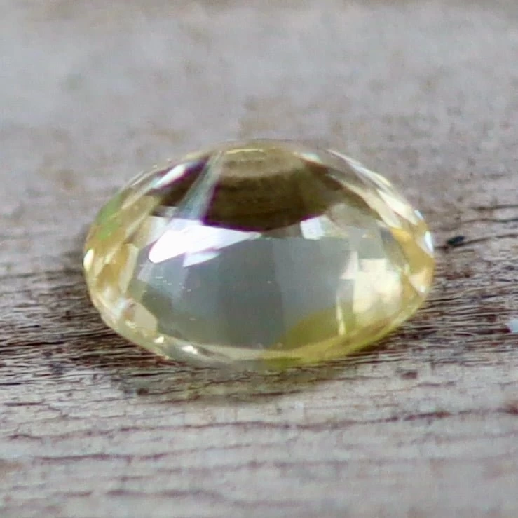 Natural Yellow Sapphire – 0.62 Carat | Oval Cut 3 Natural Yellow Sapphire – 0.62 Carat | Oval Cut - Image 3
